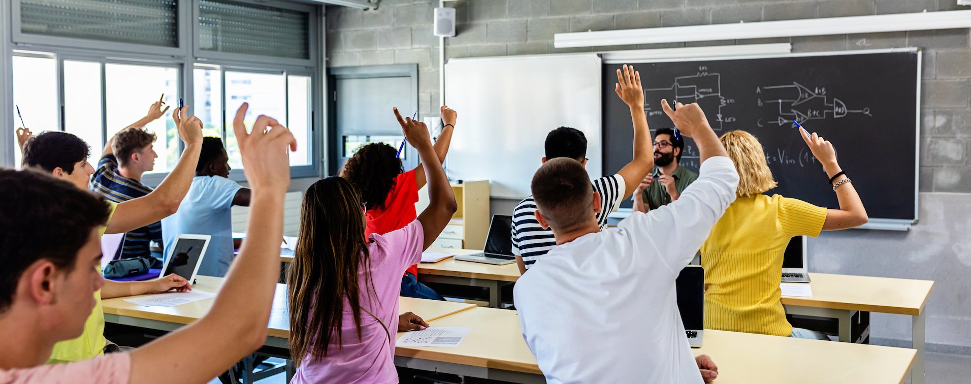 pillar page-students raising hand