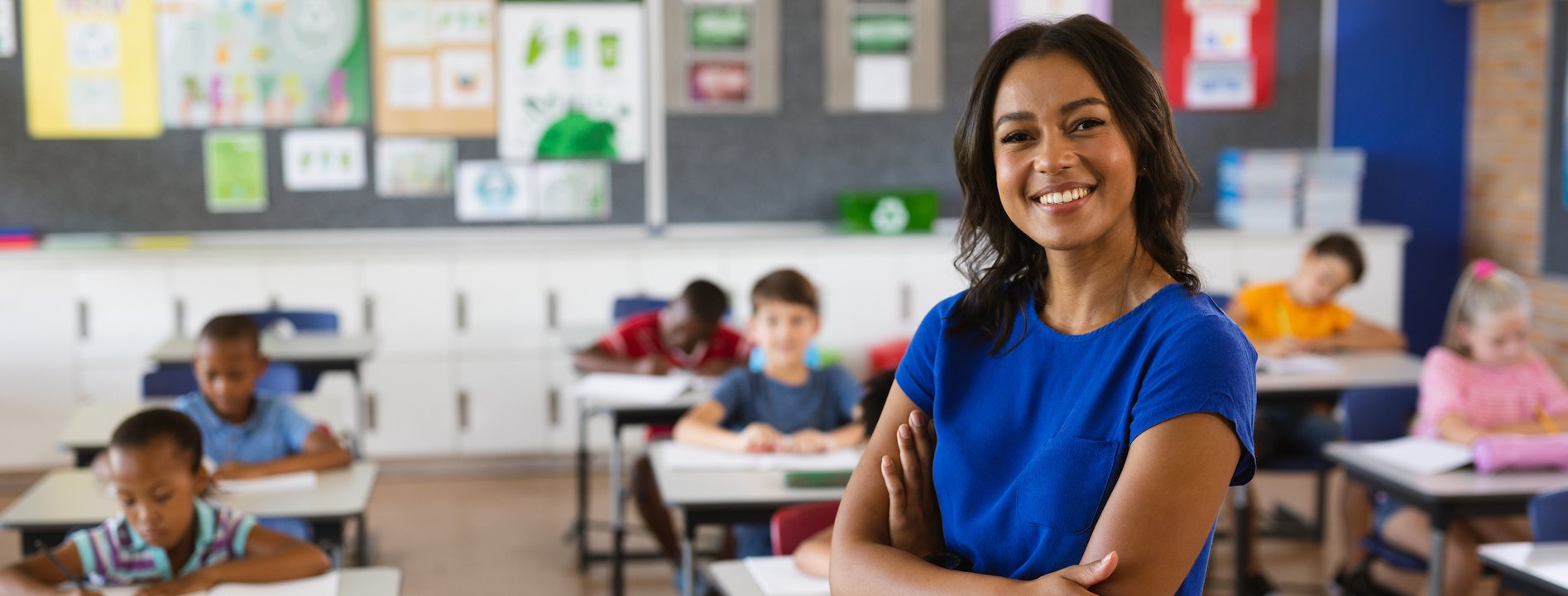 Teacher standing in front of a classroom of students