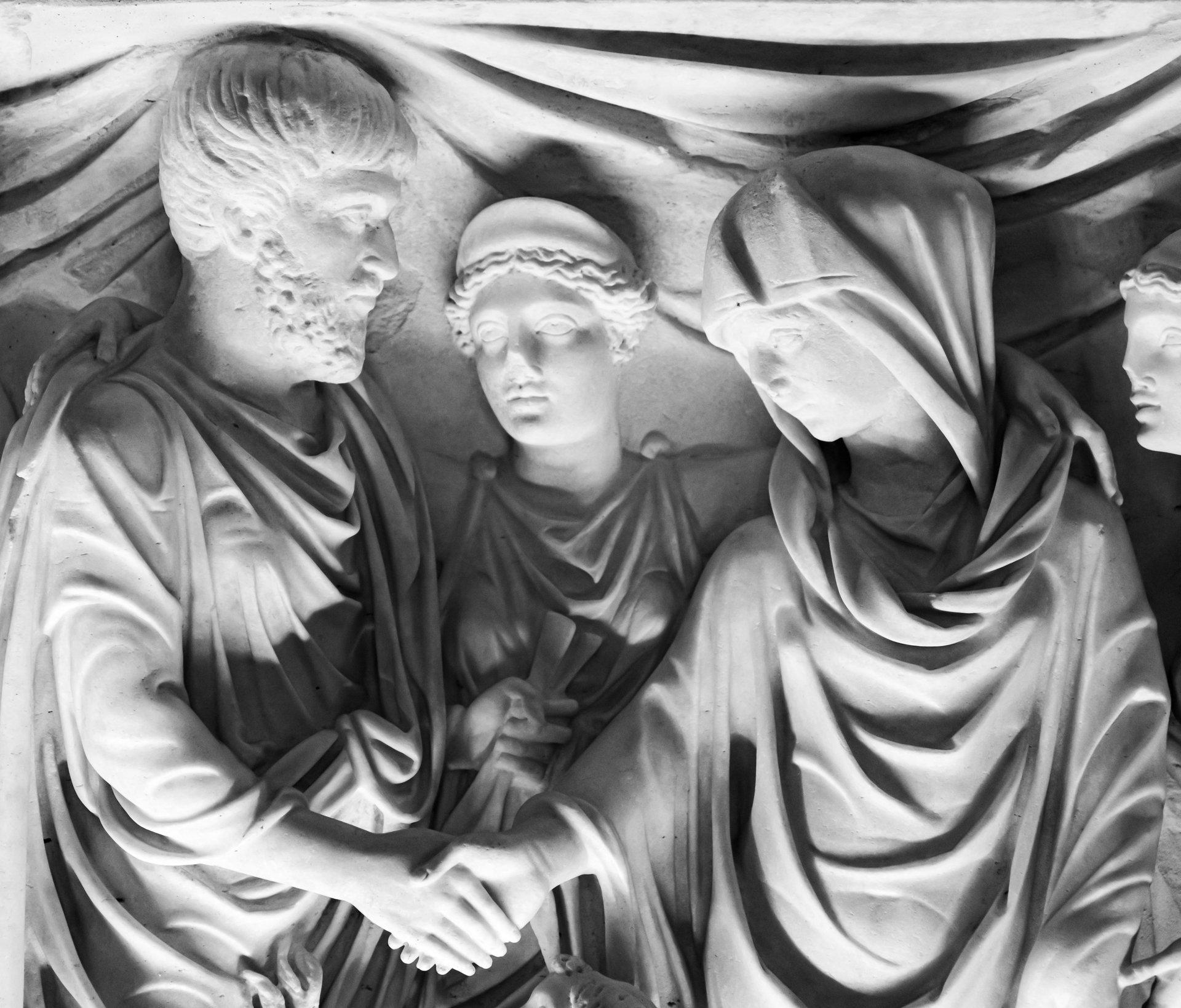 Sculpture of three people
